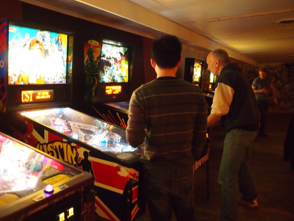 Tim watches Chris play