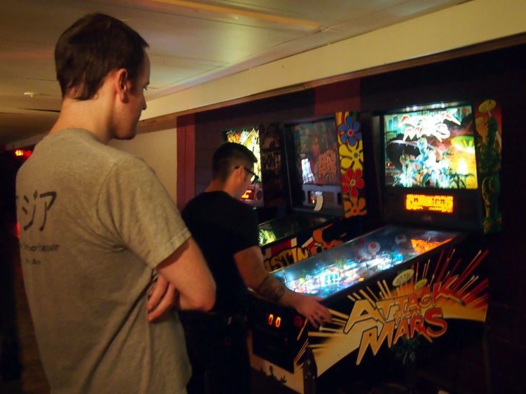 Mike watches Russell play.