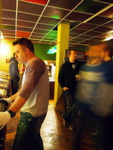 Andy and Aaron and lots of other folks mingling. It was the biggest crowd we've yet seen crammed into our little pinball alcove.