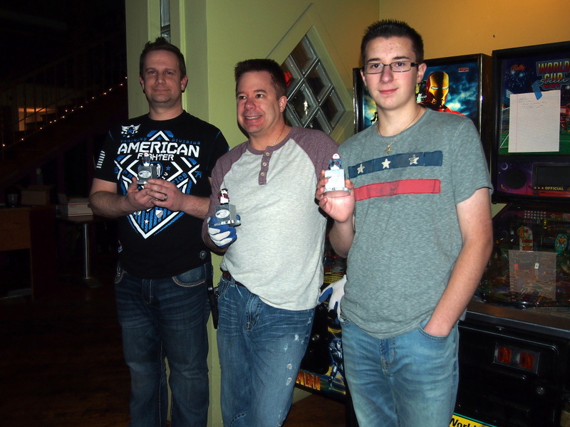 Aaron #2, Andy #1, Andrew #3, in the side tournament, with their tiny snowman trophies.