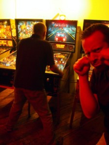 Chris playing while Mike cries.