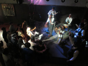 A nattily-dressed band played for an equally nattily-dressed audience while league was going on. It appeared that they were doing a video shoot.