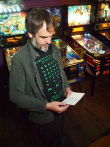 Joseph tallies up his score for the night.