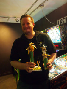 Mike with his trophies for the main and side tournaments.