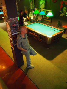 Chris watches Mike play Ghostbusters in the final match.