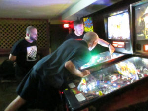 Mike pointing at Monster Bash while Chris looks.