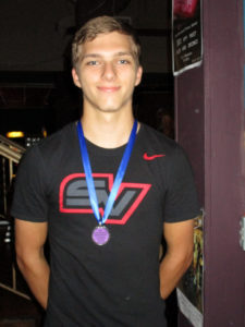 Tyler with his Smackdown Undercard winner medal.