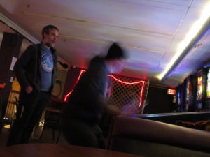 Joseph looking surprised or sympathetic while Danny is a blur (probably saving a ball).