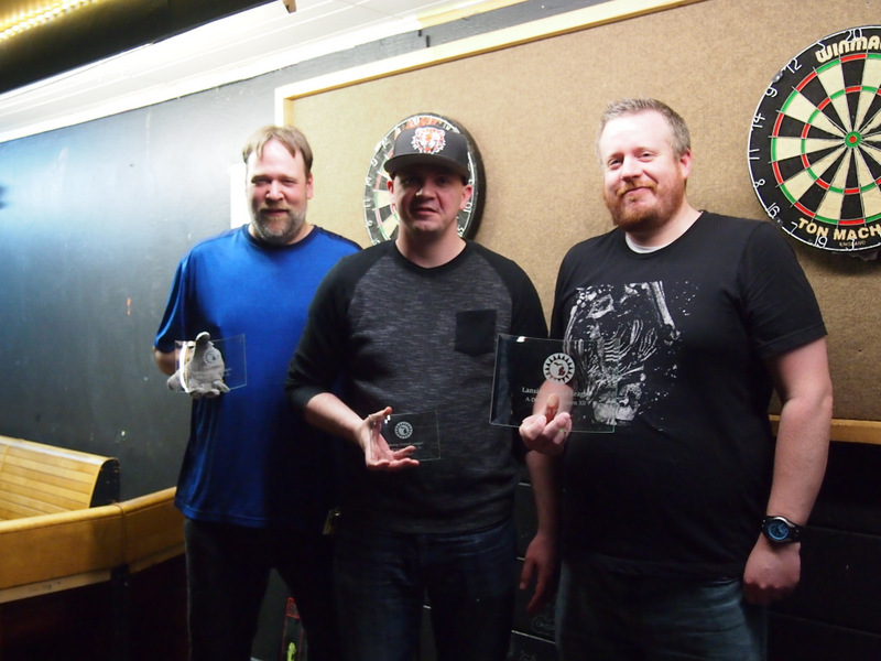Jason, Danny, and Mike, with their trophies.