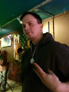 Danny posing with his Smackdown medal on.